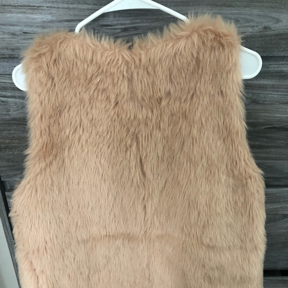 Pink fur vest